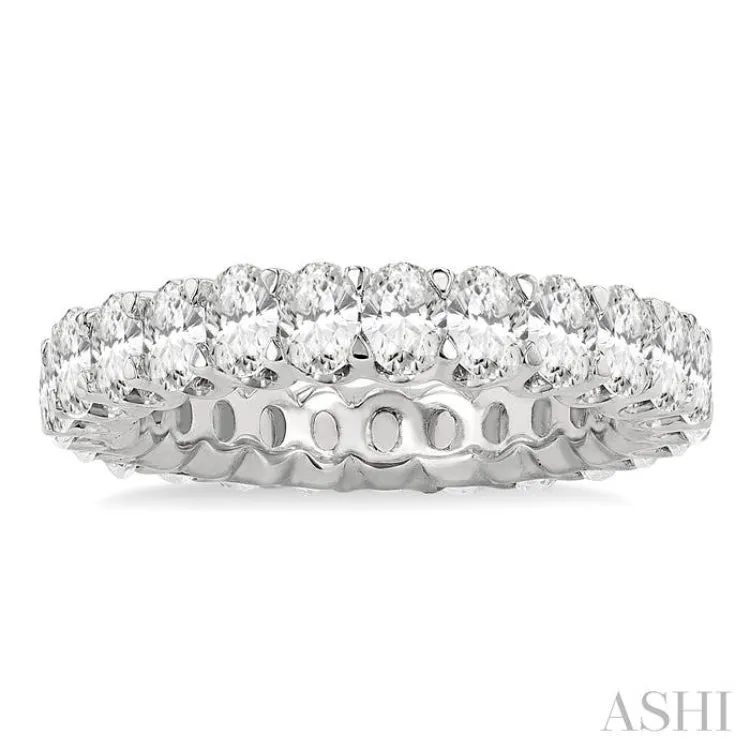 3 Ctw Eternity Oval Cut Diamond Wedding Band in 14K White Gold